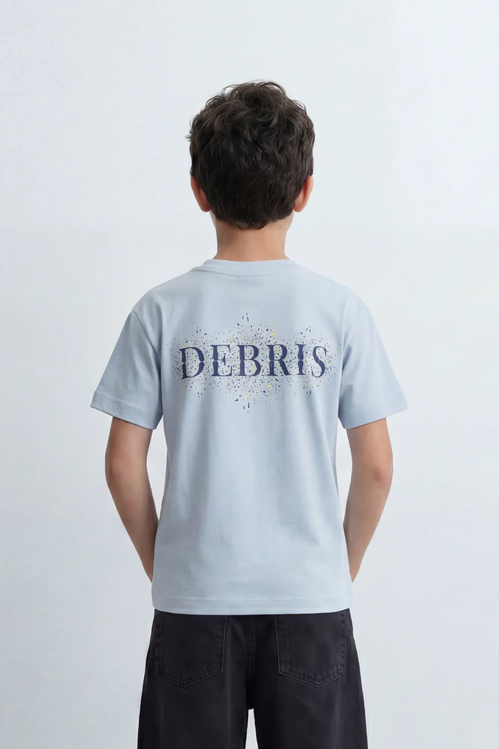 Boy's Tomato Store Debris Burst T-Shirt Made From Soft Cotton Knit Fabric Featuring Large Back Typography Print Distressed Speckle Splash Artwork - Image 10