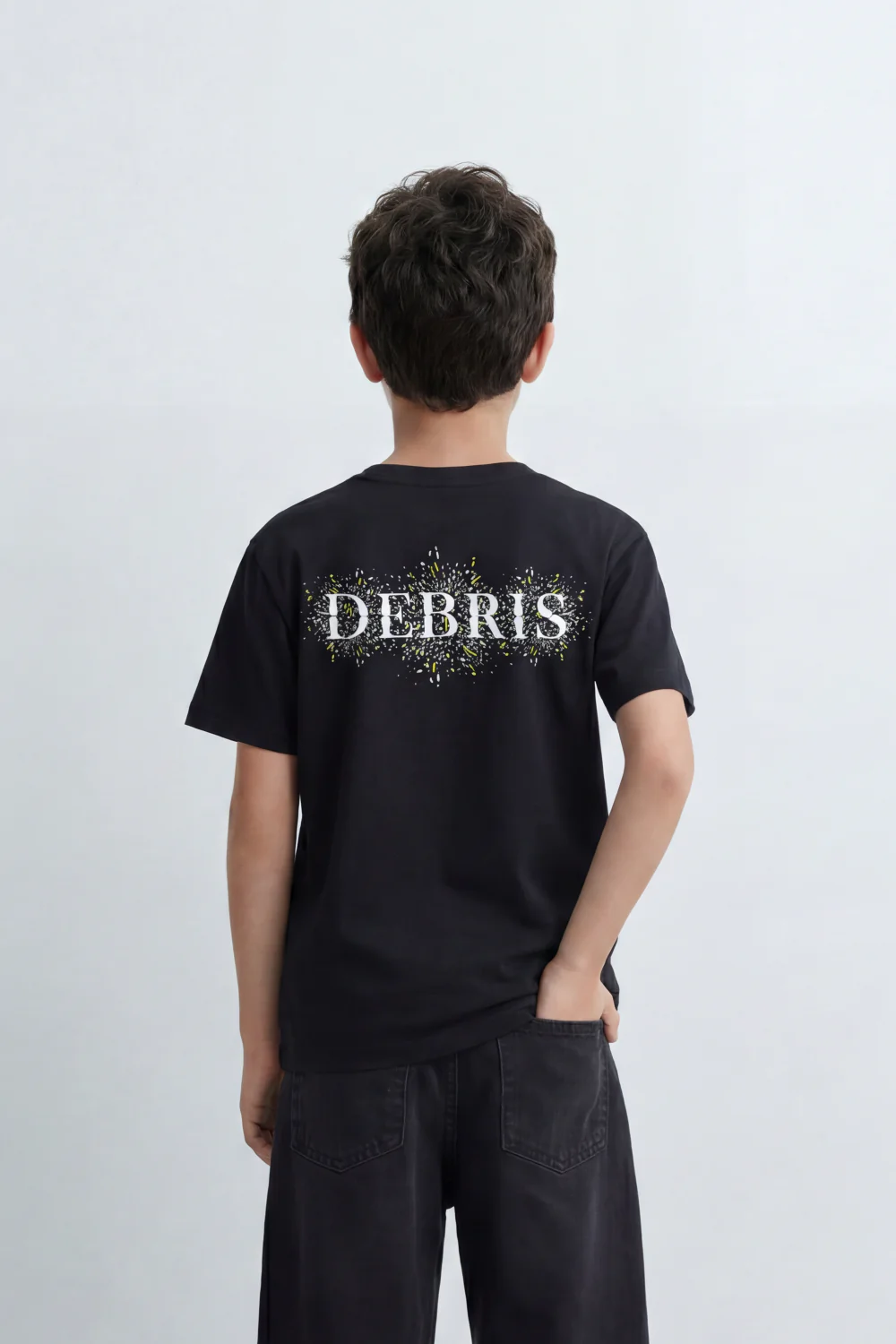 Boy's Tomato Store Debris Burst T-Shirt Made From Soft Cotton Knit Fabric Featuring Large Back Typography Print Distressed Speckle Splash Artwork - Image 2