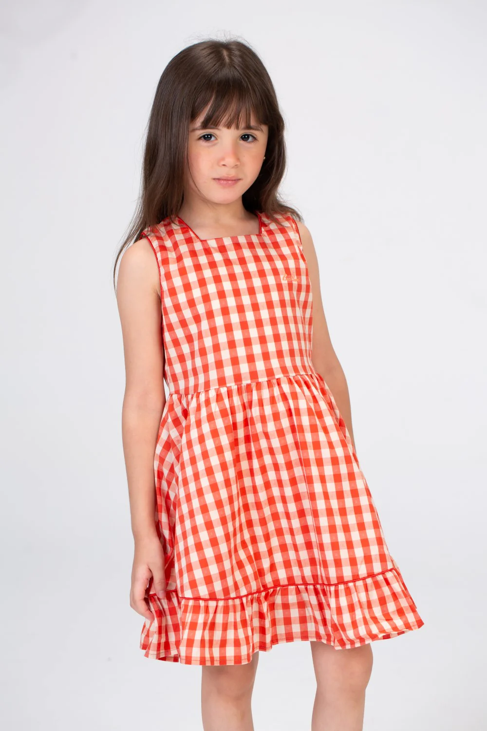 Girls Sleeveless Checkered Dress With Ruffles At The Bottom In Red - Image 3