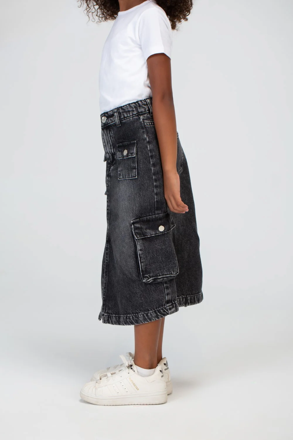 Girls Slouchy Jeans Skirt With A Trendy Pocket And A Unique Cut - Image 9