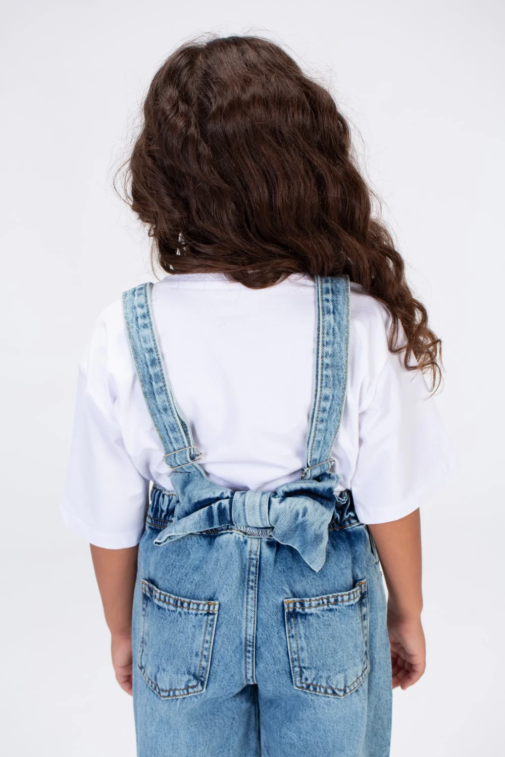 Girls Used Slouchy Jeans Jumpsuit With A Bow Tie At The Back And A Modern Cut - Image 2