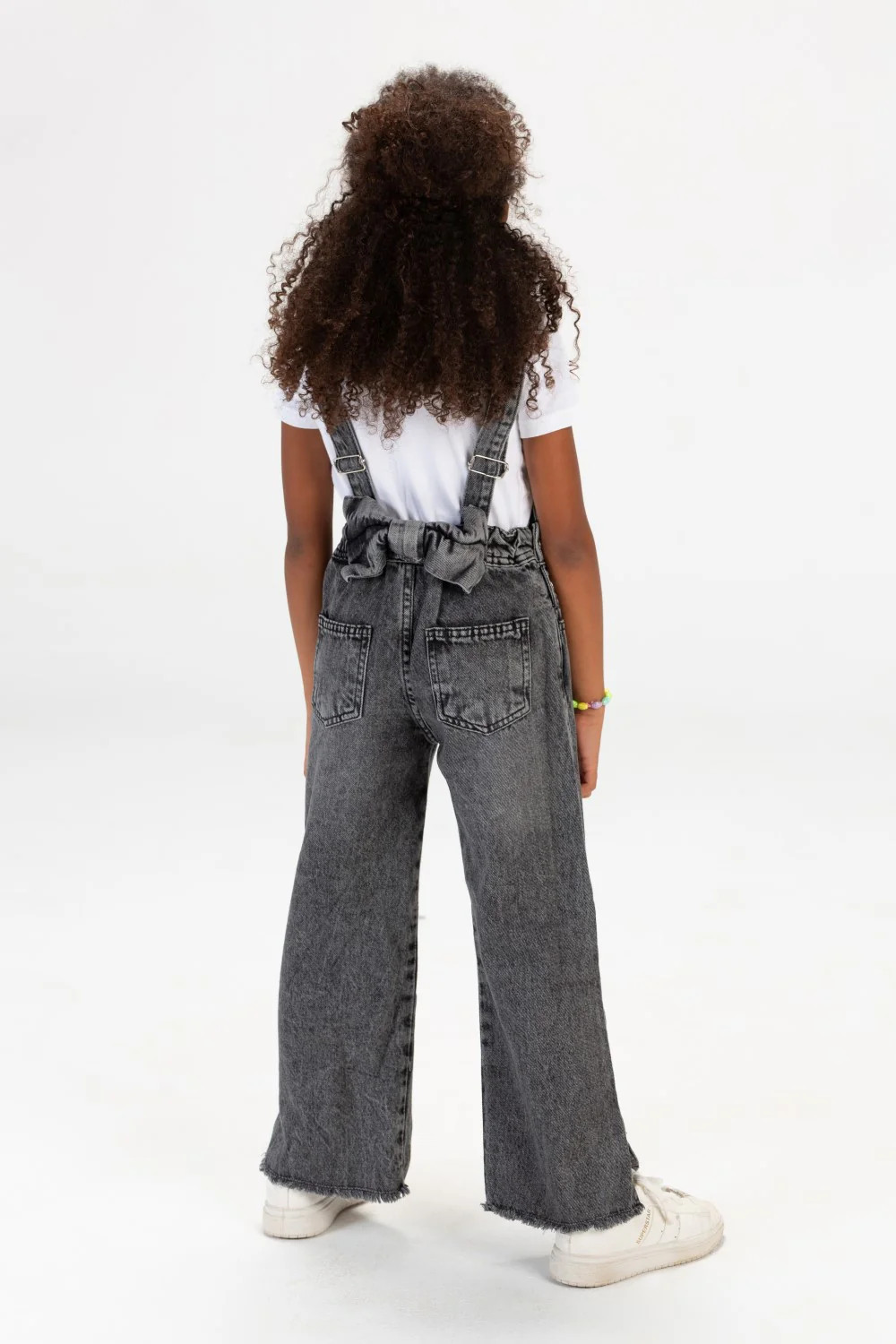 Girls Used Slouchy Jeans Jumpsuit With A Bow Tie At The Back And A Modern Cut - Image 6