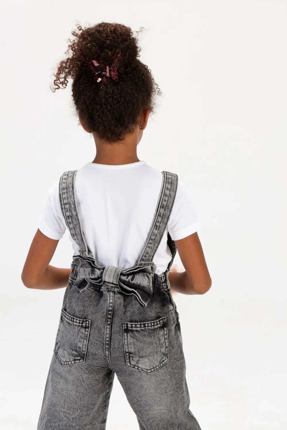 Girls Used Slouchy Jeans Jumpsuit With A Bow Tie At The Back And A Modern Cut - Image 9
