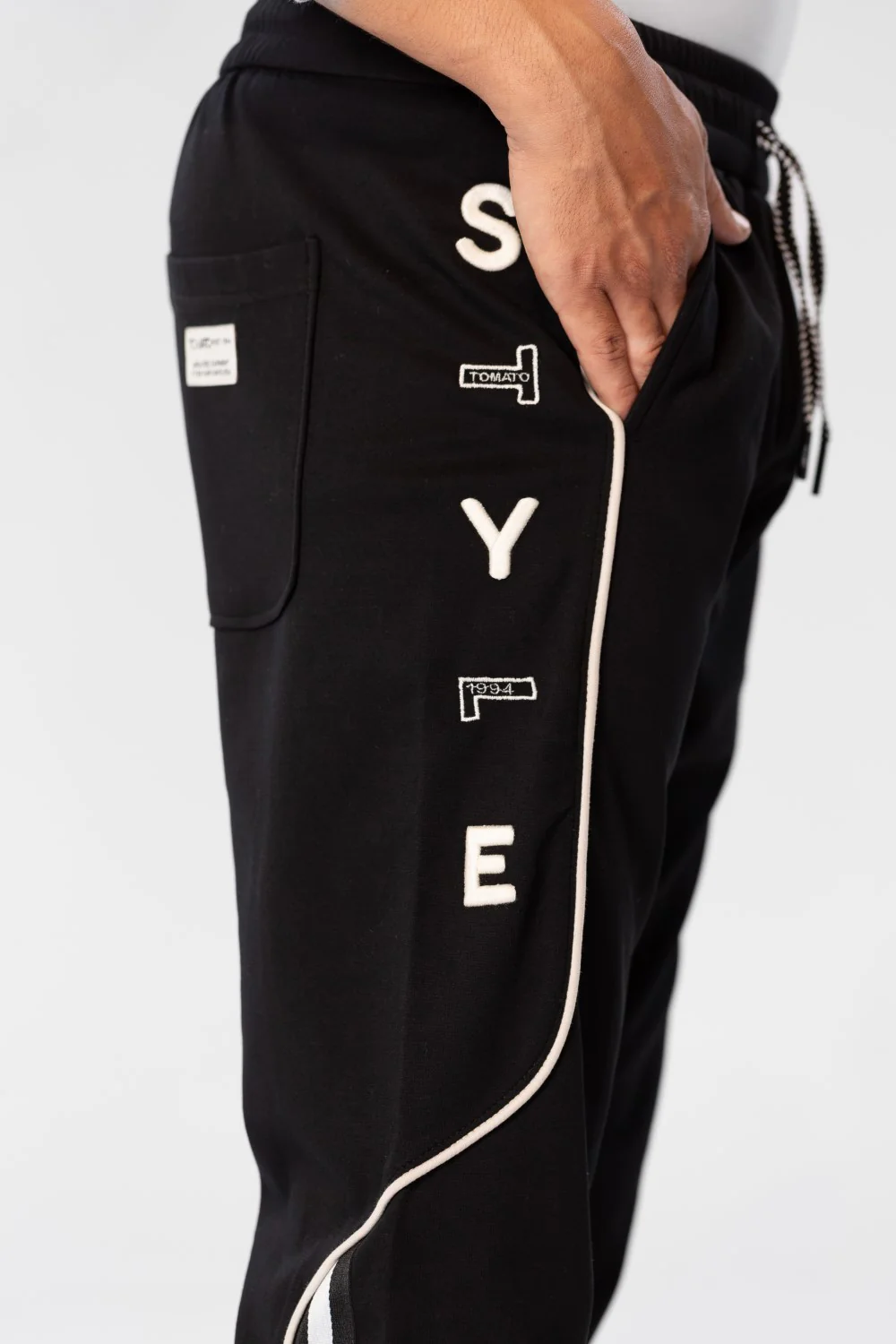 Men's Sweatpants With A Modern Fit And A Text Print On The Side - Image 4
